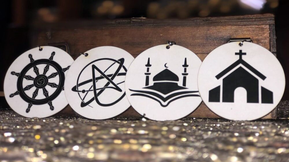 Symbole für Christentum, Buddhismus, Atheismus und Islam